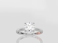 Solitaire Round Center Diamond Engagement Ring with Peek-A-Boo Diamonds